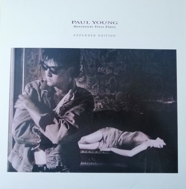 Paul Young - Between Two Fires - Mint (M) - Vinyl