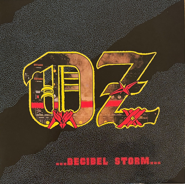 Oz (15) - Decibel Storm - Mint (M) - Vinyl
